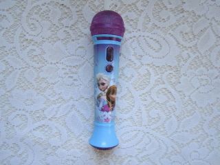 A Blue And Purple With Elsa And Anna In Front Of The Frozen Microphone