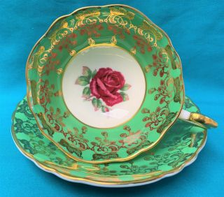 Paragon Red Floating Cabbage Rose Heavy Gold Gilt Green Cup & Saucer