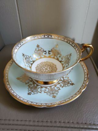 Stunning Soft Blue Paragon Teacup And Saucer Large Gold Center Heavy Gold Scroll