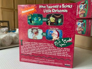 Ren and Stimpy Stinky Little Christmas Stimpy plush toy and video still 3