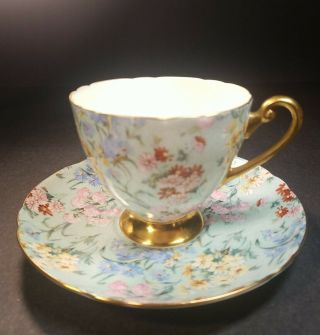 Shelley Bone China Melody Chintz Footed Teacup And Saucer Ripon Gold Trim
