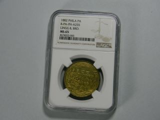 1882 PA Lingg & Bros Penn ' s Treaty Brass token R Lovett JR NGC MS 65 TOP POP 6