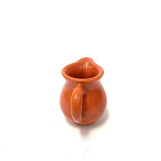 VTG Harlequin Homer Laughlin Pottery Mini Creamer Pitcher Orange Glaze 2 1/4” 2