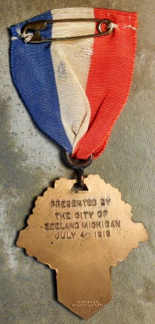 7c.  Zeeland,  Michigan,  World War Service,  July 4th,  1919.  Bronze badge WWI 2