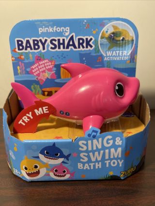 Zuru Robo Alive Junior Baby Shark Battery - Powered Sing And Swim Bath Toy Pink