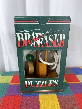 Mind Boggler Puzzle " Left Brain Teaser Wood Ring,  Rope Puzzle W/box