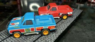 AFX TOMY 2 - GOODYEAR GMC PICK UP TRUCK (RED/WHITE) (BLU/WHT) HO Slot Cars Vintage 2