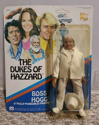 The Dukes Of Hazzard Vintage Mego Boss Hogg Figure I Un Punched.  99 Nr
