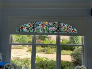 Stained Glass Arch In A Wooden Frame