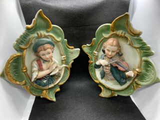 Pair 19c.  Antique German Bisque Porcelain Relief Wall Plaque Boy Violin&girl&dove