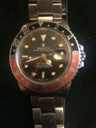 Rolex Oyster Perpetual Date Gmt Master Ii.  Black / Red