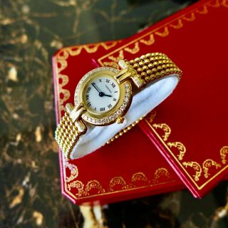 A LADIES CARTIER COLISEE IN 18K GOLD AND DIAMONDS 3