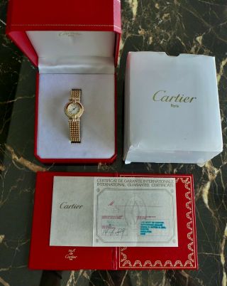 A LADIES CARTIER COLISEE IN 18K GOLD AND DIAMONDS 4