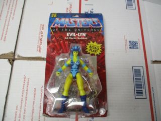 Mattel Masters Of The Universe Evil - Lyn Evil Warrior Goddess Figure & Comic Book