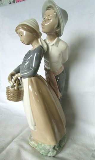 Lladro/nao Boy And Girl Out Walking He Is Looking Over Her Shoulder Heavy