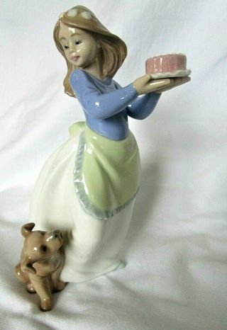 Lladro/nao Girl Carrying A Birthday Cake Her Puppy Dog Is Curious