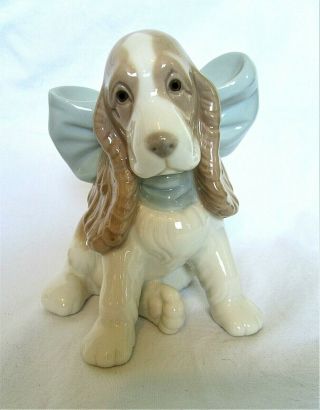 Lladro/nao Sweet Little Dog With A Big Blue Bow Round Its Neck " Present "